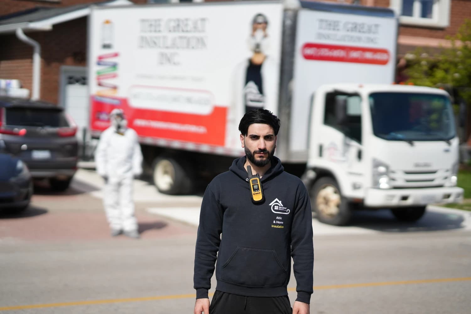 The Great Insulation crew and service trucks on a Greater Toronto job site